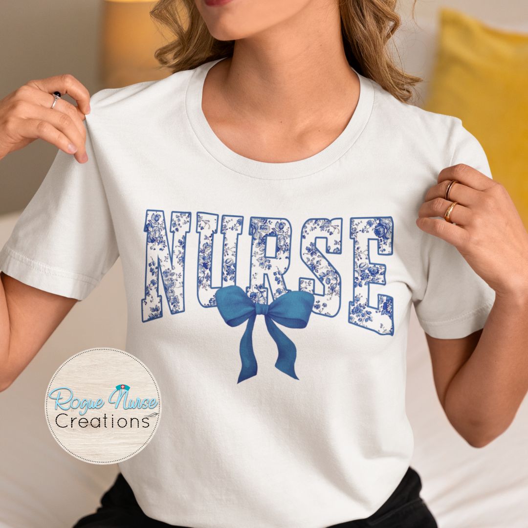Blue Floral Nurse With Blue Bow Graphic T-shirt, Cute Floral Nurse Shirt, Nurse Gift, flowers and Bow Nurse T-shirt. Pretty Bow Nurse Shirt