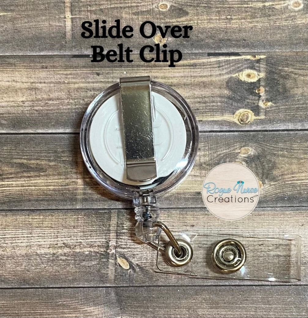 The WILTED Daisy™ Phoenix Edition Acrylic Badge Reel. Original Design With a White Petals with Burning Edge and a Yellow Center.