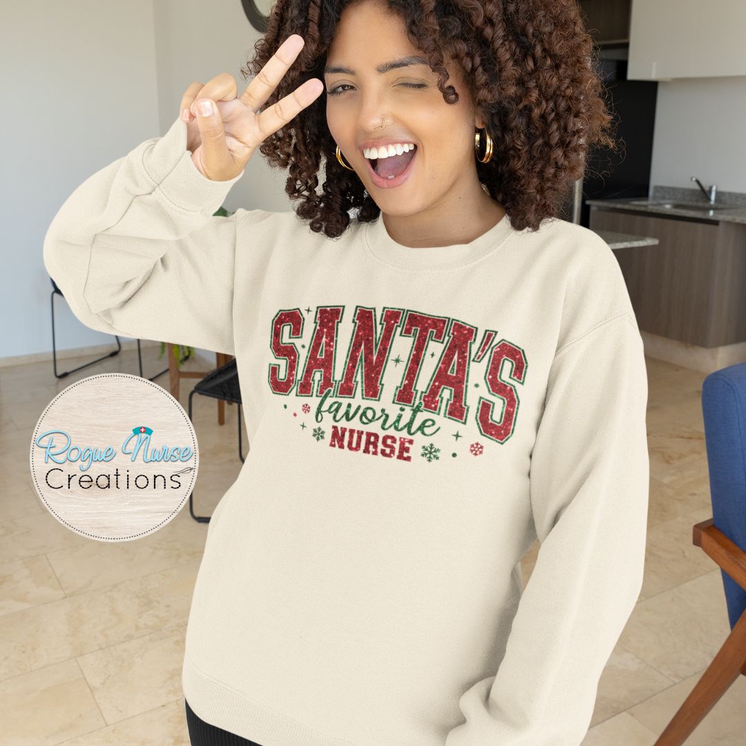 Santa’s Favorite Nurse Glitter looking Graphic Sweatshirt, Nurse Crew Pullover, Nurse Gift, Cute Red & Green Christmas Sweatshirt for Nurses
