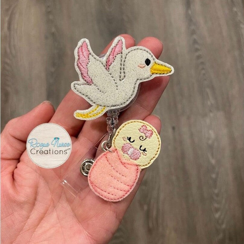 White Glitter Stork Carrying a Swaddled Infant Embroidered Retractable Badge Reel, Baby Nurse Badge Buddy, Swaddled Baby Boy