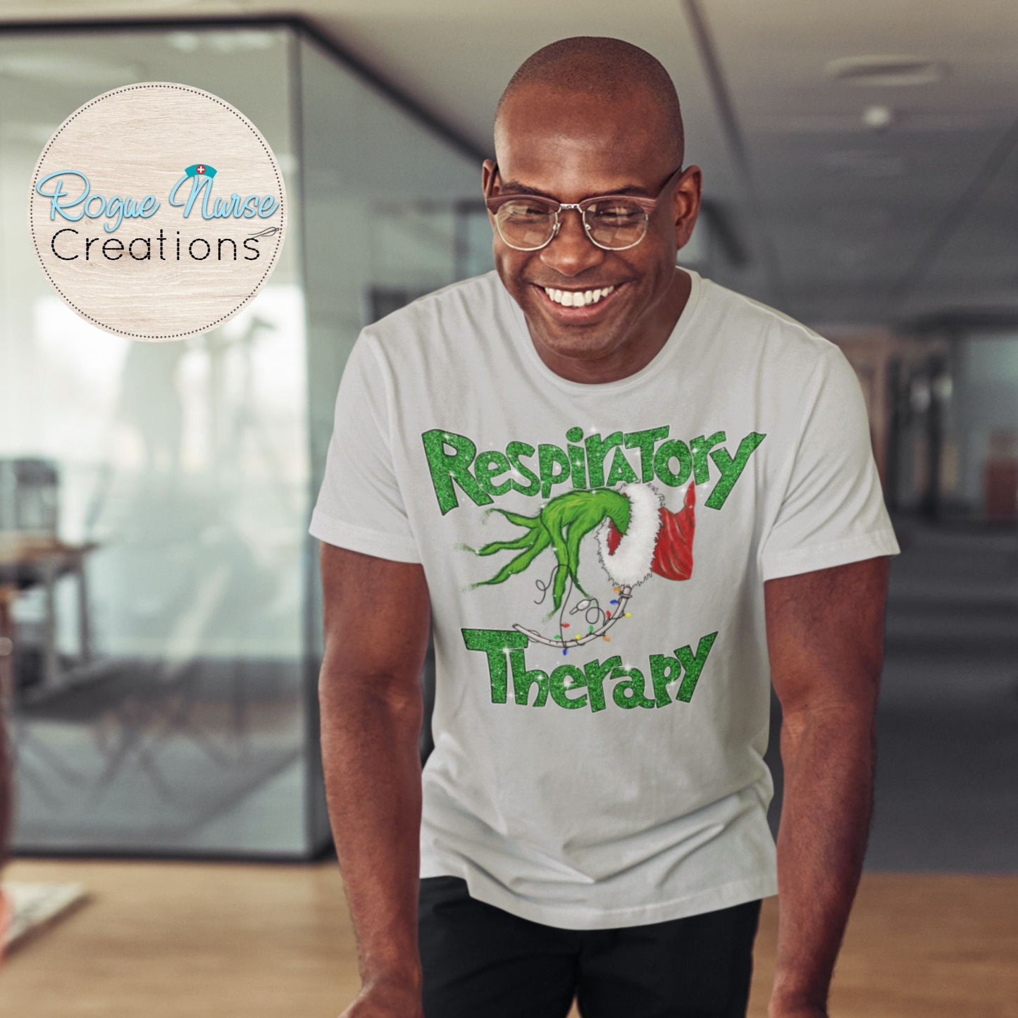 Holiday Respiratory Therapy Graphic T-Shirt, Grinchy Fingers Holding an Intubation Tube, RT Intubation Christmas T-Shirt, RT Gift