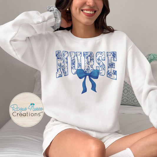 Blue Floral Nurse With Blue Bow Graphic Pullover Sweatshirt, Cute Nurse Sweatshirt, Nurse Gift, Cozy Nurse Pullover. Pretty Bow Nurse Shirt