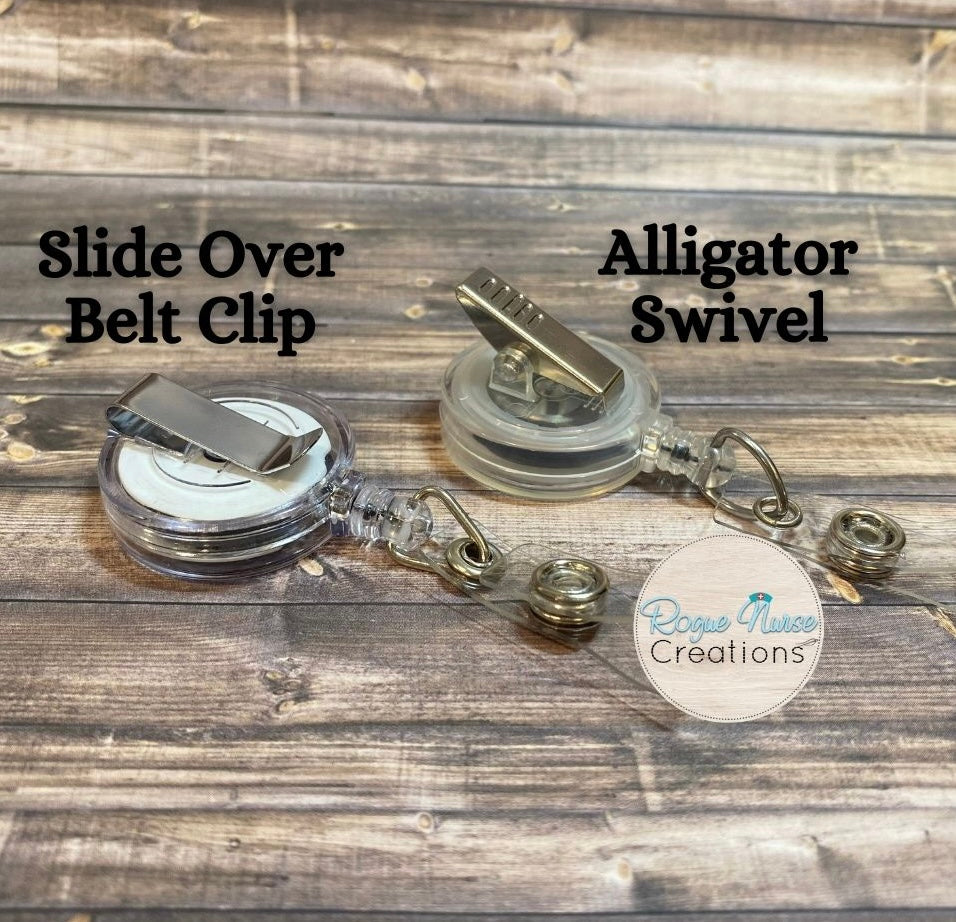 The WILTED Daisy™ Phoenix Edition Acrylic Badge Reel. Original Design With a White Petals with Burning Edge and a Yellow Center.