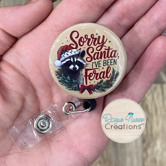 Sorry Santa I’ve Been Feral Christmas Button Style Retractable Badge Reel, Beige Background, Raccoon Button Badge Holder, Badge Buddy