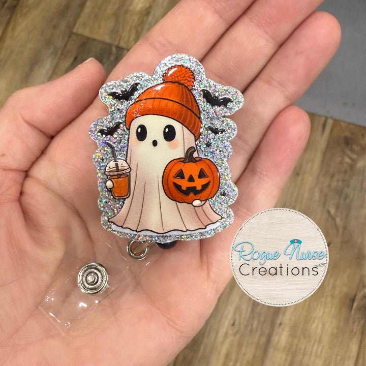 Halloween Ghost Wearing a Beanie, Holding a Pumpkin and an Ice Coffee Retractable Badge Reel, UV Printed on Silver Glitter Acrylic