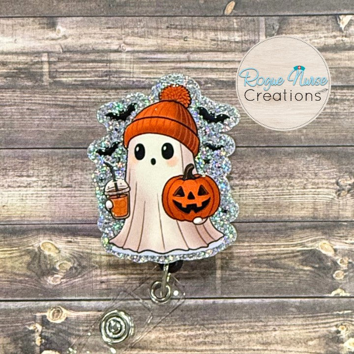 Halloween Ghost Wearing a Beanie, Holding a Pumpkin and an Ice Coffee Retractable Badge Reel, UV Printed on Silver Glitter Acrylic