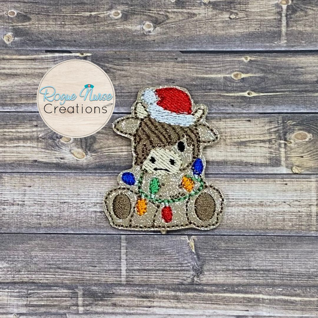 Holiday Highland Cow With a Santa Hat And String of Lights, Embroidered Retractable Badge Reel, Beige Glitter Holiday Cow Badge Reel