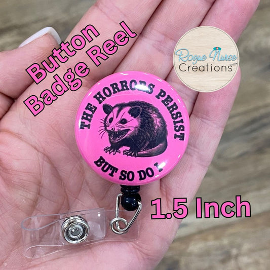 The Horrors Persist But So Do I, Opossum Button Style Retractable Badge Reel, PINK Background, Opossum Button Badge Holder