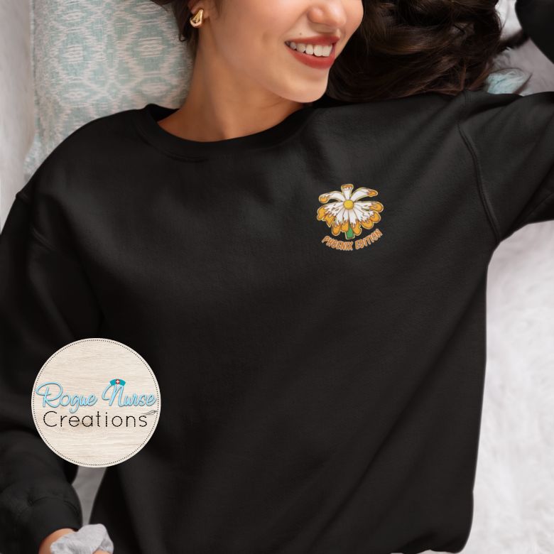 The WILTED Daisy™  Phoenix Edition “Still Rising” Graphic Pullover Sweatshirt With Words.