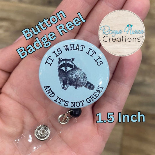 It Is What It Is And It’s Not Great Button Style Retractable Badge Reel, light blue Background, Raccoon Button Badge Holder, Badge Buddy