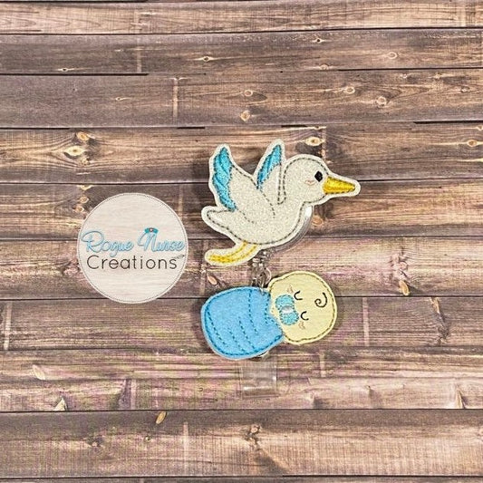 White Glitter Stork Carrying a Swaddled Infant Embroidered Retractable Badge Reel, Baby Nurse Badge Buddy, Swaddled Baby Boy